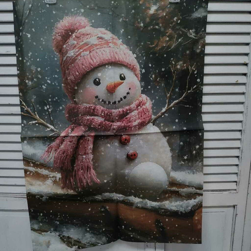 Snowman on Sled